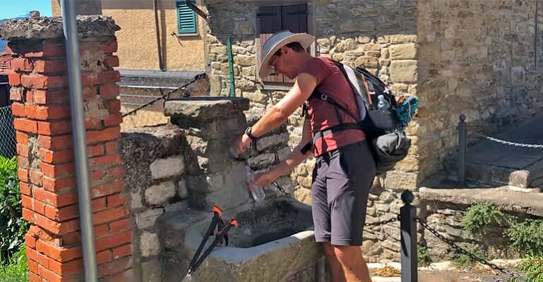 A pilgrim filling his water in Lonnano